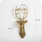 DecorBites™ Golden Deer Head Wall Hook: Antique Bronze Resin Animal Pendant for Stylish Wall Decor